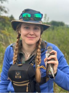 Arin Underwood holding a Lesser Yellowleg